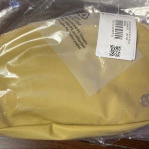 NWT- Yellow/ gold everyday crossbody bag- still in plastic